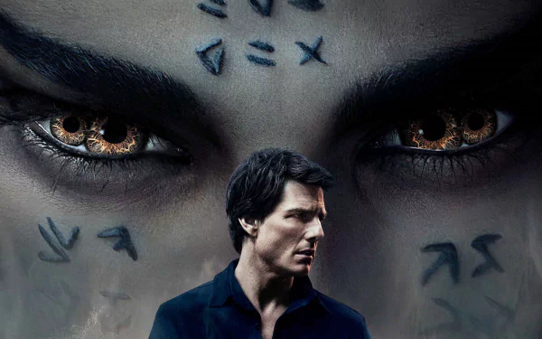 HD desktop wallpaper of the movie The Mummy (2017) featuring Tom Cruise, showcasing intense eyes with ancient symbols in the background.