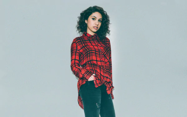 HD desktop wallpaper featuring a person dressed in a red plaid shirt posing confidently against a grey background.