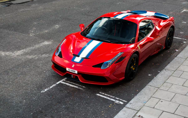 Red Ferrari 458 Speciale supercar with white and blue racing stripes parked on the street, shown in high-definition desktop wallpaper quality.