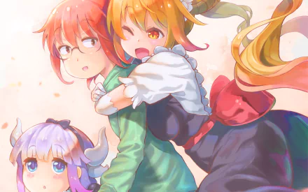 HD desktop wallpaper featuring Kobayashi, Tohru, and Kanna Kamui from Miss Kobayashi's Dragon Maid anime. Tohru winks while hugging Kobayashi, with Kanna adorably peeking from below.