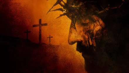 HD PC desktop wallpaper featuring a dramatic close-up of Jesus with a crown of thorns, set against a fiery background with three crosses, inspired by the movie The Passion of the Christ.