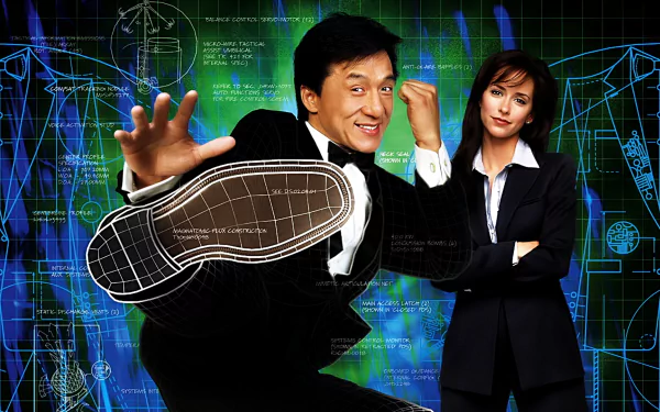 HD desktop wallpaper featuring Jennifer Love Hewitt and Jackie Chan from the movie The Tuxedo, with a dynamic background of blueprint designs and glowing effects.