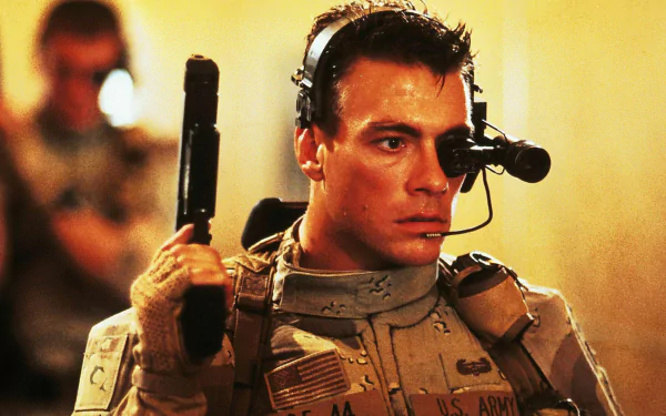 Close-up of a tactical soldier with headset and weapon in a scene from the movie Universal Soldier — HD PC desktop wallpaper and background.