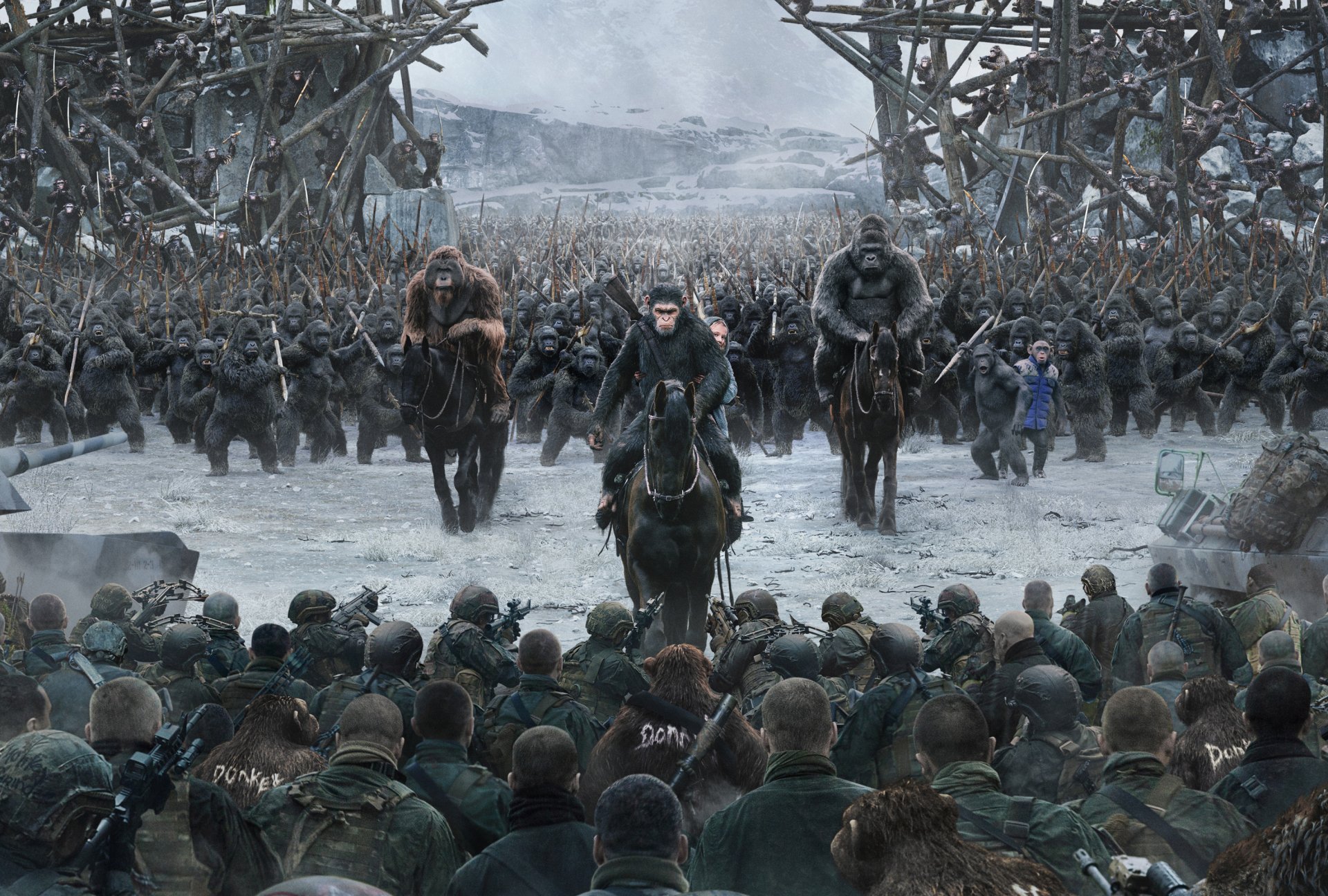 HD desktop wallpaper featuring a battle scene from the movie War For The Planet Of The Apes, where apes on horseback confront a large group of soldiers amidst a snowy, apocalyptic backdrop.