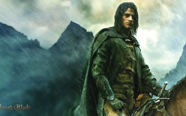 Video game Mount & Blade HD PC desktop wallpaper: cloaked warrior in rain-soaked mountains gripping reins and sword amid a moody green-gray atmosphere.