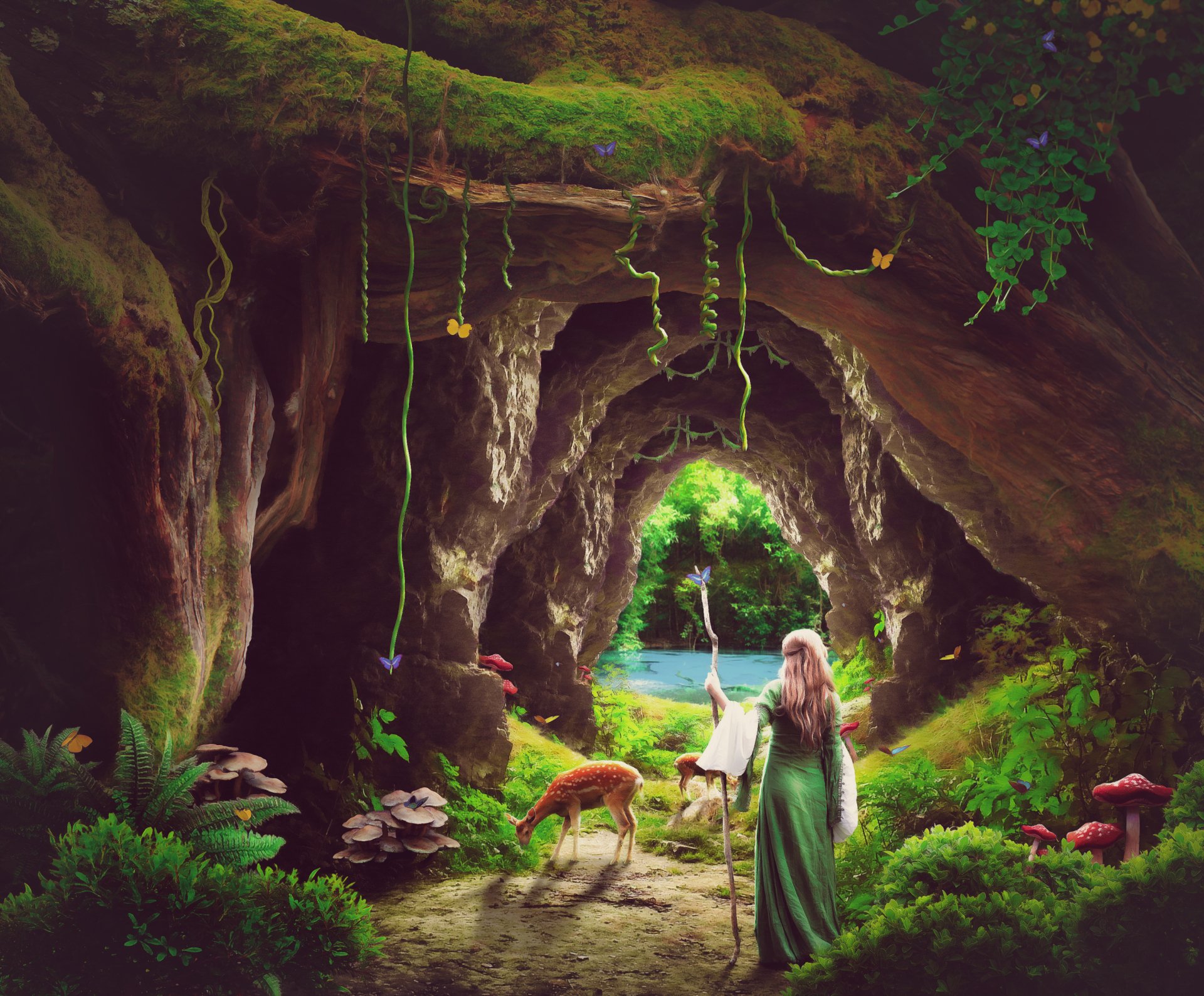 HD fantasy PC desktop wallpaper depicting a woman in a green dress with a deer inside a lush forest cave opening to a bright, green landscape beyond.