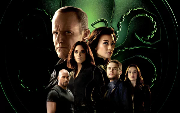 4K Ultra HD wallpaper featuring Jemma Simmons, Daisy Johnson, Melinda May, and Phil Coulson from the TV show Agents of S.H.I.E.L.D. with a dark, sleek background.