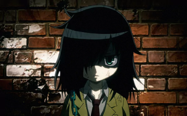 Tomoko Kuroki from the anime Watamote stands against a textured brick wall, her expression conveying a mix of intensity and introspection in this HD desktop wallpaper.