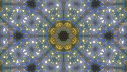 HD PC desktop wallpaper featuring a kaleidoscopic mandala manipulation: radiant gold central ring, blue-green starfield points and repeating abstract geometric pattern.