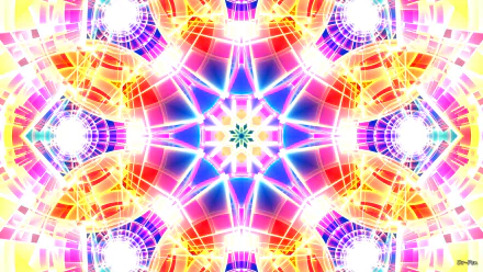 A vibrant HD desktop wallpaper featuring a colorful abstract mandala with bright hues of blue, red, orange, purple, and yellow, forming an intricate spectrum pattern.