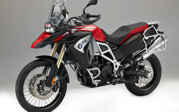 Red BMW F800GS Adventure motorcycle showcased in high detail, captured as a 4K Ultra HD PC desktop wallpaper and background.