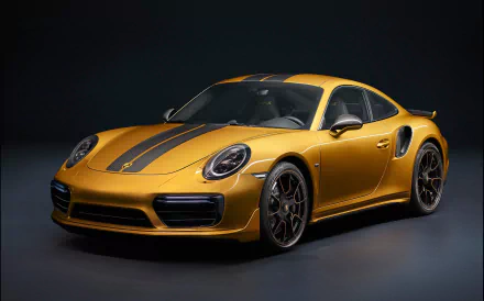 HD desktop wallpaper featuring a stunning gold Porsche 911 Turbo, showcasing the sleek design and high-performance capabilities of the vehicle against a dark background.