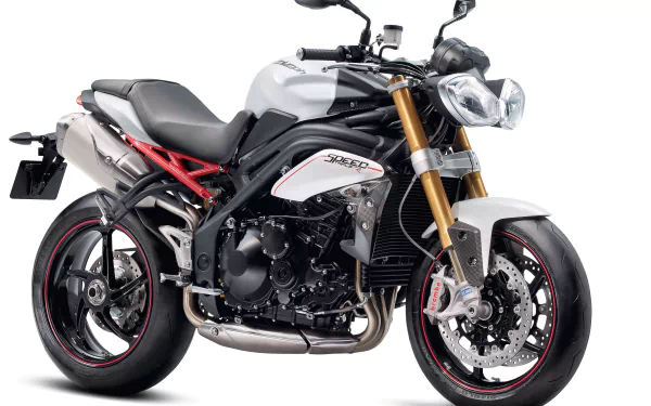 High-resolution 4K Ultra HD image of a Triumph Street Triple motorcycle, showcasing the sleek design and detailing of this iconic vehicle.