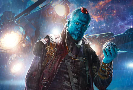 4K Ultra HD wallpaper featuring Michael Rooker as Yondu Udonta from the movie Guardians of the Galaxy, set against a vibrant cosmic background.