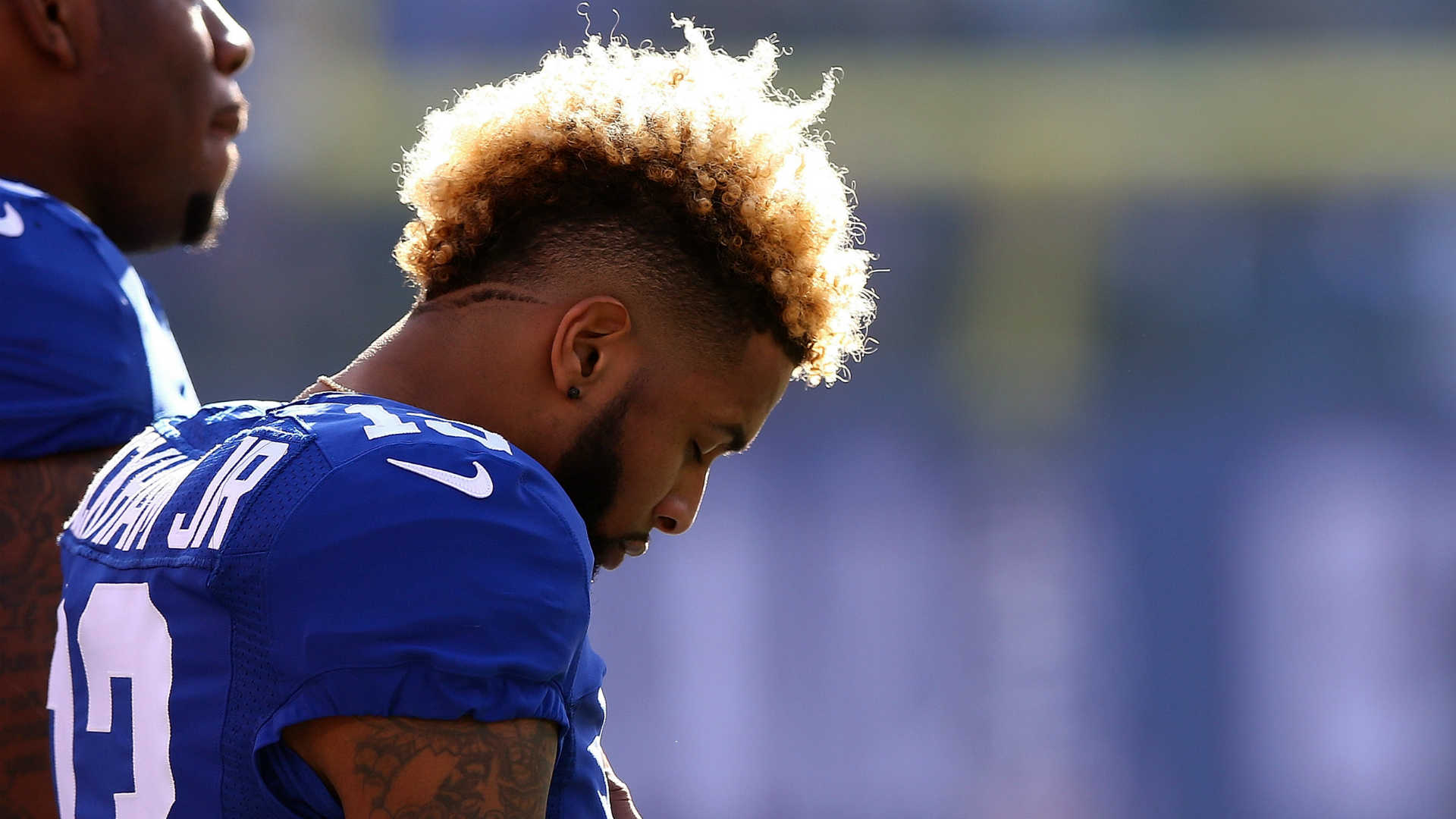 HD wallpaper featuring a New York Giants player, wearing number 13, against a sunny backdrop.