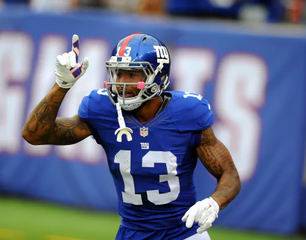 HD desktop wallpaper featuring New York Giants player Odell Beckham Jr. in his blue number 13 jersey on the field.