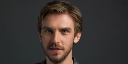 HD desktop wallpaper featuring a portrait of a man with a dark backdrop, providing an engaging background for screens.