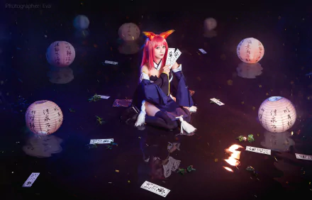 HD PC desktop wallpaper featuring a woman cosplaying Tamamo no Mae from Fate/Grand Order and Fate/Extra, surrounded by glowing lanterns and floating cards.