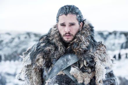 4K Ultra HD PC desktop wallpaper featuring Kit Harington as Jon Snow from the TV show Game of Thrones, dressed in winter fur attire against a snowy backdrop.