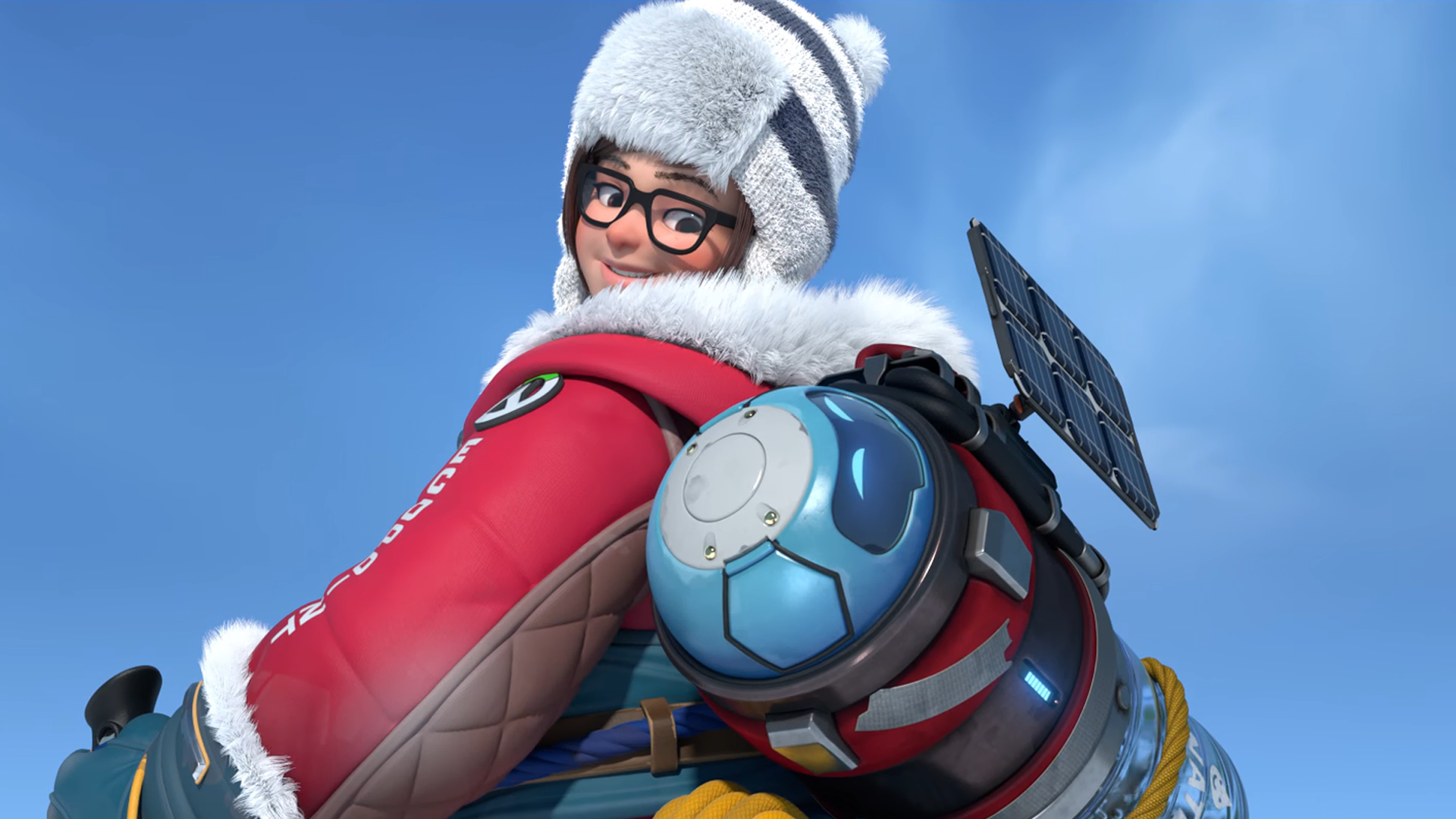 HD PC desktop wallpaper featuring Mei from the video game Overwatch, showcasing her in winter attire with a clear blue sky background.