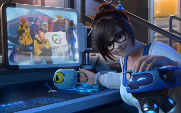 HD desktop wallpaper featuring Mei from the video game Overwatch, seen in a futuristic setting interacting with her equipment while a projected image of a team photo is displayed on a screen.