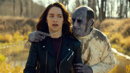 Wynonna Earp TV show scene: woman in leather jacket held at knife-point by a pale undead figure — HD PC desktop wallpaper/background
