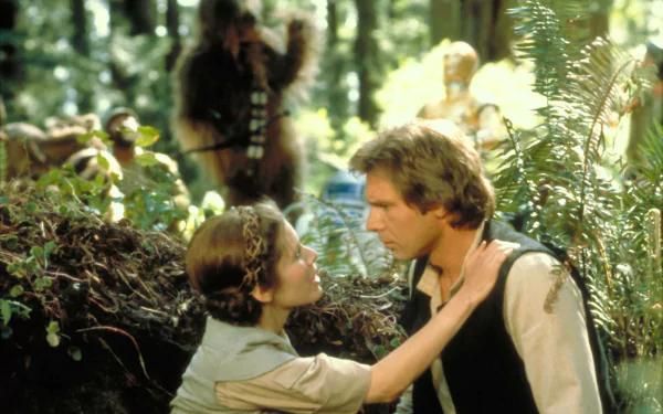 Princess Leia Organa and Han Solo, played by Carrie Fisher and Harrison Ford, share a moment with Chewbacca in this HD wallpaper from Star Wars Episode VI: Return of the Jedi.