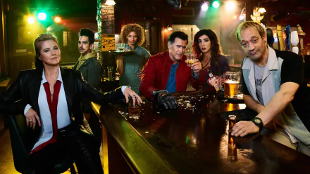 TV show Ash vs. Evil Dead characters gathered at a smoky bar, drinks and weapons on the counter; 2K Quad HD PC desktop wallpaper and background.