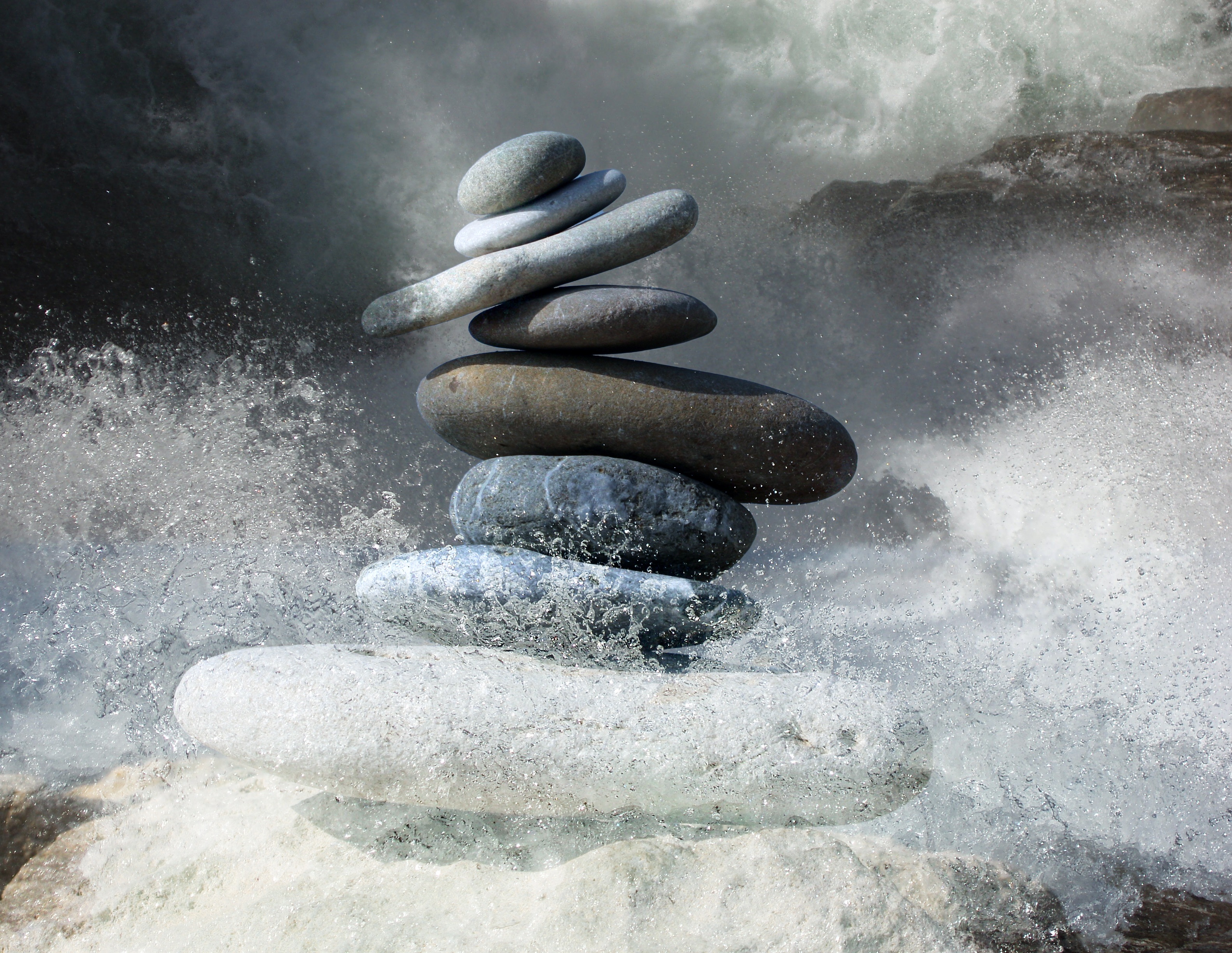 Zen Stones with Water Splashing Around Them by Karen Arnold