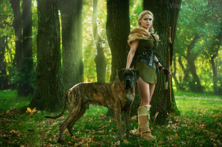 HD desktop wallpaper featuring a woman in cosplay attire with a dog, standing in a lush forest.