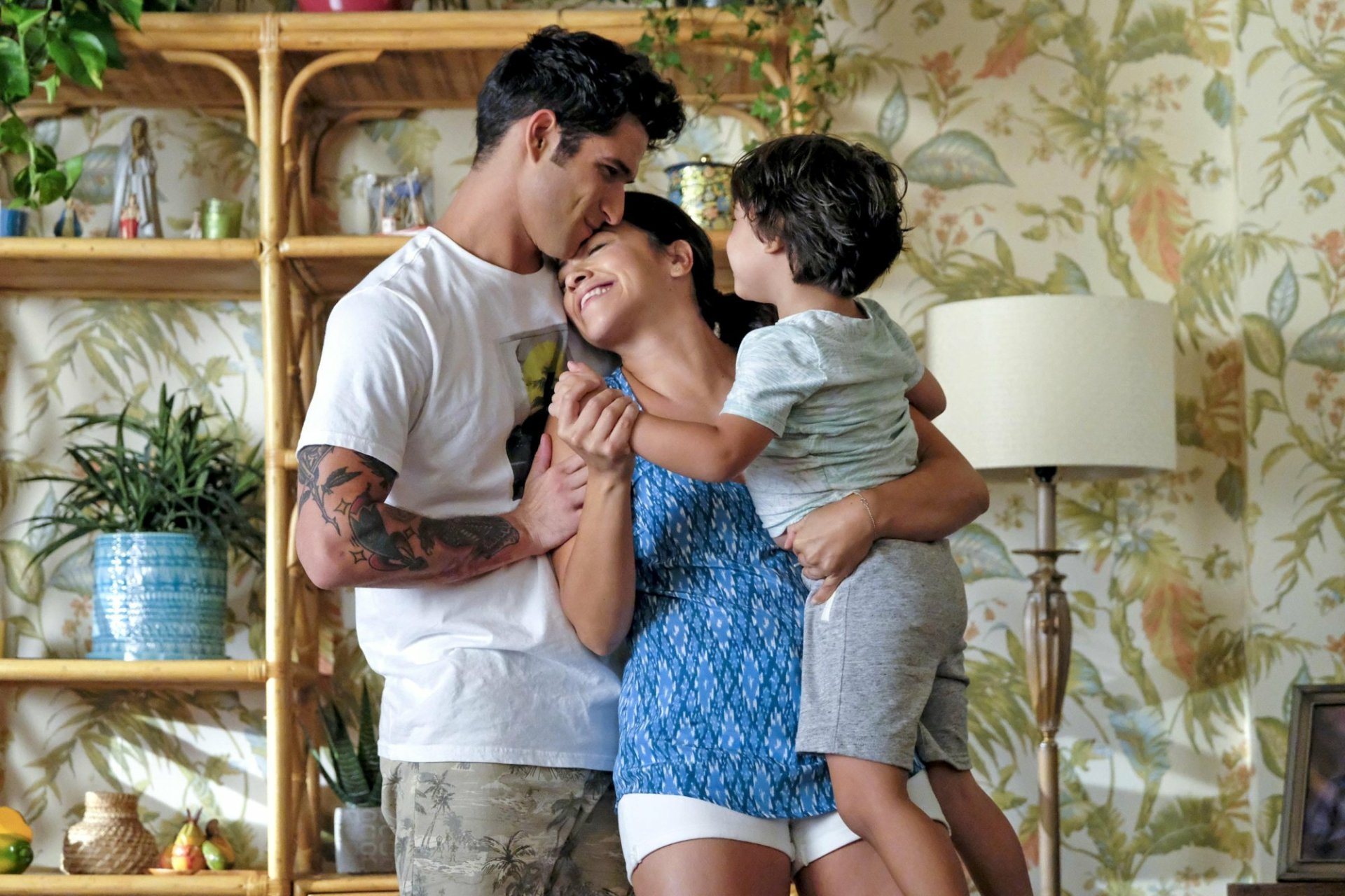HD wallpaper of a heartwarming scene from 'Jane the Virgin' featuring a joyful family embrace.