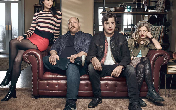 HD desktop wallpaper featuring four characters from the TV show Loudermilk posed in a vintage-style room.