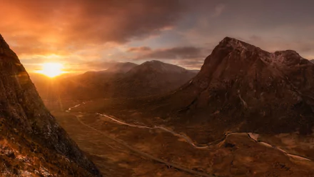 Sunset over Beinn a'Chrulaiste and the surrounding valley in the Scottish Highlands, showcasing dramatic landscapes and natural beauty in this HD desktop wallpaper.