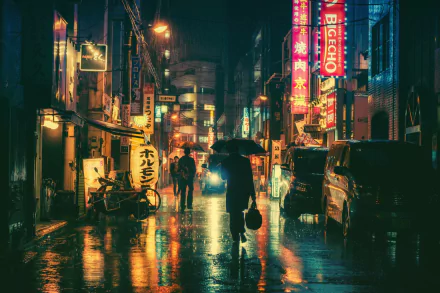 A rain-soaked Japanese city street at night, illuminated by vibrant neon signs and reflected lights, with pedestrians under umbrellas. This HD wallpaper captures the urban nightlife ambiance.