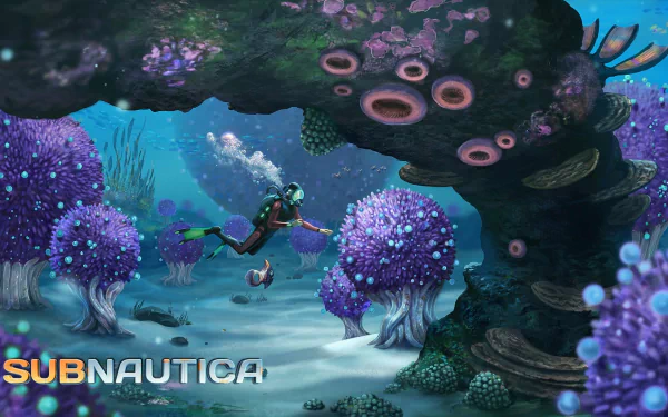 HD PC desktop wallpaper from the video game Subnautica, showcasing an underwater scene with a diver exploring vibrant coral reefs and marine life.