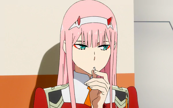 Anime character Zero Two from Darling in the FranXX with pink hair, green eyes, and red horns, holding her hand near her mouth, in a detailed HD wallpaper.