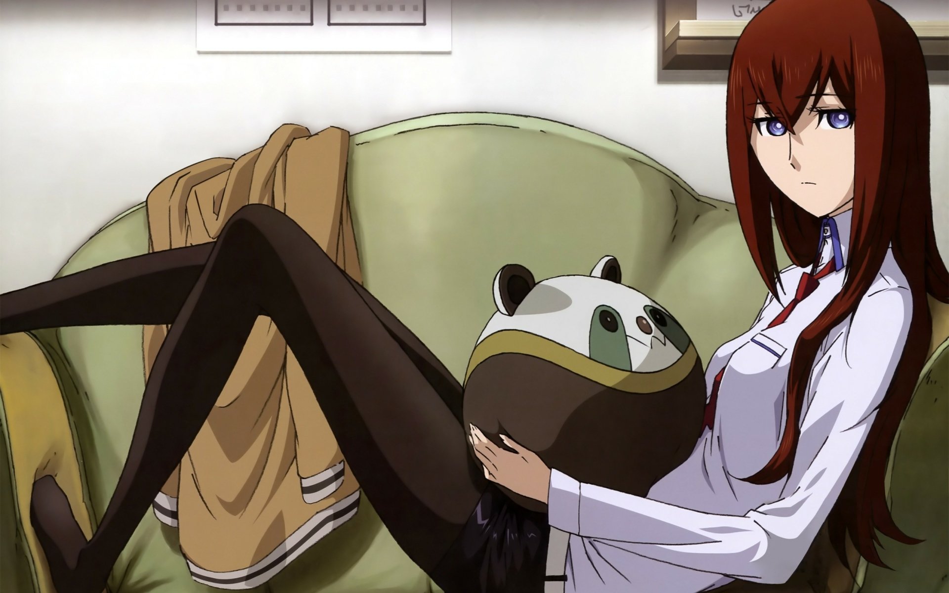 HD desktop wallpaper of Kurisu Makise from the anime Steins;Gate, showing her sitting on a couch, holding a panda hat, with a focused expression.
