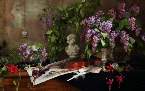 A still life HD desktop wallpaper featuring a violin, sheet music, a pocket watch, a bust sculpture, fuchsia and lilac flowers, feathers, and lush greenery arranged with classical elegance.