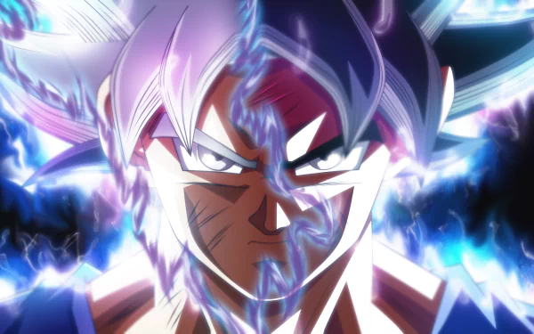 HD wallpaper of Goku in Ultra Instinct form from Dragon Ball Super, featuring vibrant and dynamic energy aura surrounding him, emphasizing his intense focus and power.
