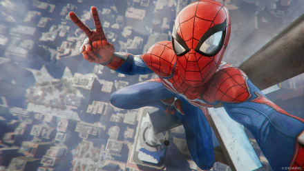 HD wallpaper featuring Spider-Man from the video game Spider-Man (PS4), showing him perched high above the city, making a peace sign gesture. The cityscape below is slightly blurred in the background.