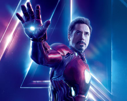 HD desktop wallpaper featuring Tony Stark as Iron Man, portrayed by Robert Downey Jr., from the movie Avengers: Infinity War. The background has a dynamic, glowing blue and purple design.