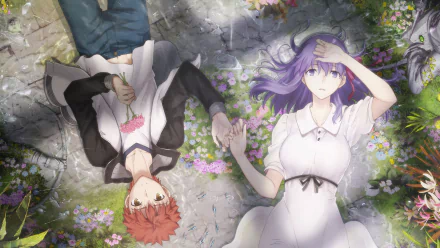 HD desktop wallpaper of Shirou Emiya and Sakura Matou from the anime Fate/stay Night Movie: Heaven's Feel, lying on the ground surrounded by flowers, holding hands and looking upwards.