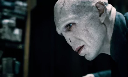 HD PC desktop wallpaper featuring Lord Voldemort from the movie Harry Potter and the Deathly Hallows: Part 1, showcasing his pale, menacing profile in dark surroundings.