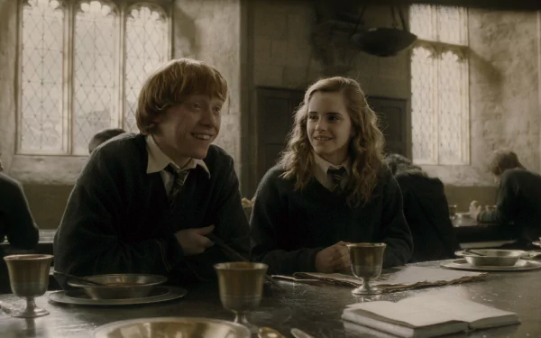 HD wallpaper featuring Hermione Granger and Ron Weasley sharing a moment in the Great Hall from the movie Harry Potter and the Half-Blood Prince.