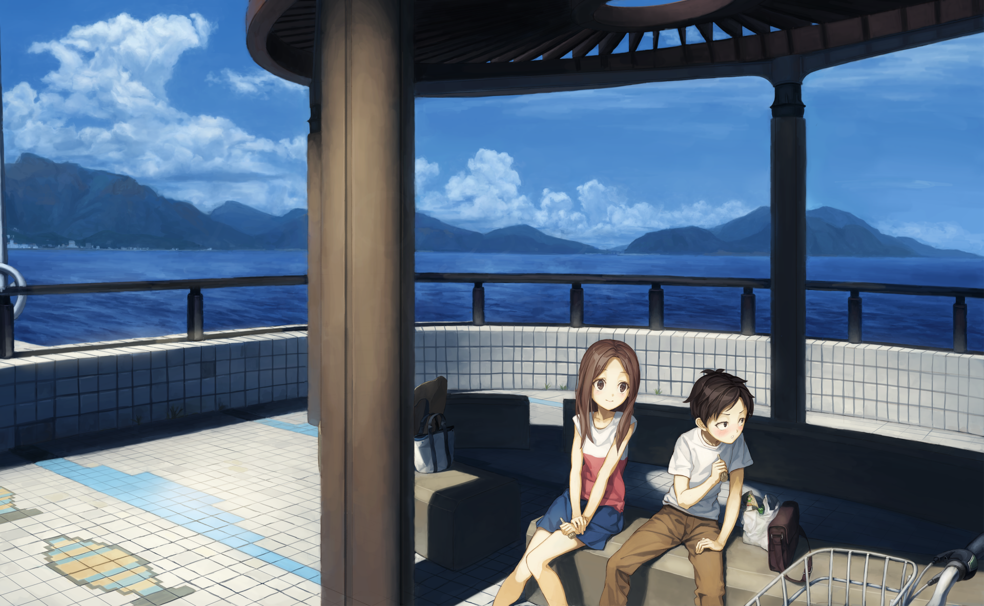 HD wallpaper featuring Takagi and Nishikata from the anime Karakai Jouzu no Takagi-san, sitting under a shaded structure with a scenic view of mountains and the ocean in the background.