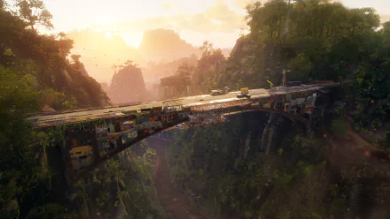 HD PC desktop wallpaper from the video game Just Cause 4, featuring a scenic view of a bridge surrounded by lush jungle and distant mountains at sunset.