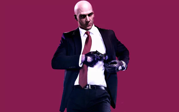 HD PC desktop wallpaper of Agent 47 from the video game Hitman 2, featuring him adjusting his gloves against a solid purple background.