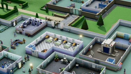 HD desktop wallpaper featuring an isometric view of a busy hospital from the game Two Point Hospital.