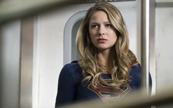HD PC desktop wallpaper of Melissa Benoist as Kara Zor-El from the TV show Supergirl, featuring her in the iconic superhero costume.