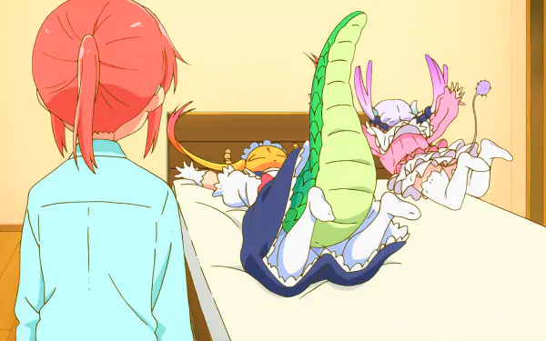 Kobayashi watches Kanna Kamui and Tohru playfully tumble on a bed in a bright anime scene from Miss Kobayashi's Dragon Maid. HD PC desktop wallpaper/background.